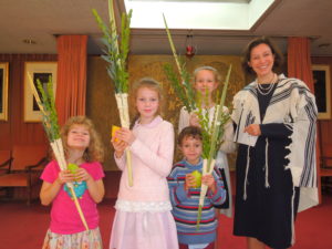 Everyone gets to shake a Lulav! - photo by Maurice Hoffman